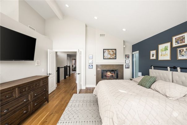 Bedroom, Fireplace, Interior, Recessed Lighting, Wood Texture Flooring