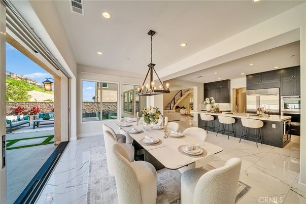 Chandelier, Dining room, Interior, Kitchen, Marble, Pendant Lights, Recessed Lighting, Stainless Steel Appliances, Water