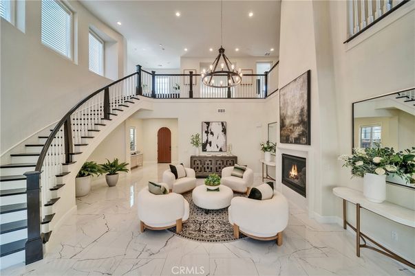 Chandelier, Fireplace, Interior, Living room, Marble, Recessed Lighting