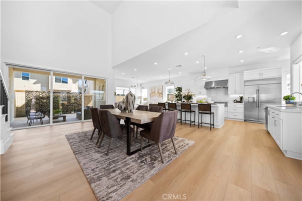 Dining room, Interior, Kitchen, Pendant Lights, Recessed Lighting, Stainless Steel Appliances, Wood Texture Flooring