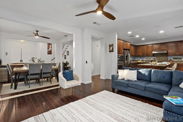Dining room, Interior, Kitchen, Living room, Recessed Lighting, Stainless Steel Appliances, Wood Texture Flooring