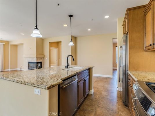 Fireplace, Interior, Kitchen, Pendant Lights, Recessed Lighting, Stainless Steel Appliances