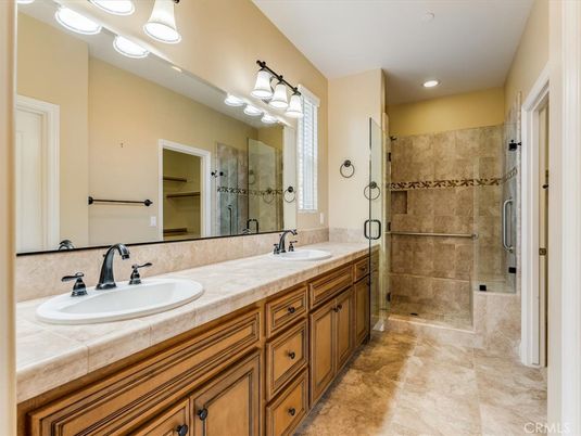 Bathroom, Dual Sink Vanities, Glass Shower, Interior, Recessed Lighting, Tile Countertops