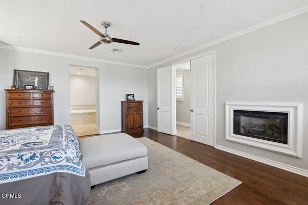 Bedroom, Fireplace, Interior, Recessed Lighting, Wood Texture Flooring