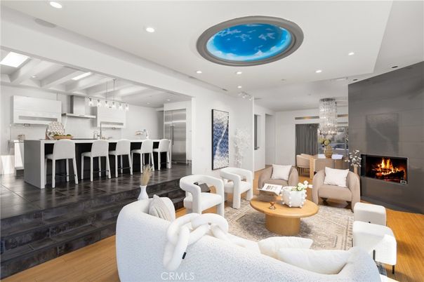Dining room, Fireplace, Interior, Kitchen, Living room, Pendant Lights, Recessed Lighting, Stainless Steel Appliances, Wood Texture Flooring