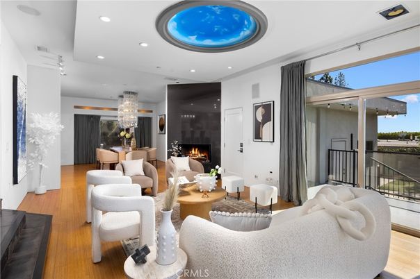 Chandelier, Dining room, Fireplace, Interior, Living room, Recessed Lighting, Wood Texture Flooring