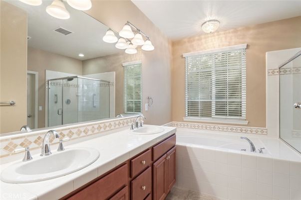 Bathroom, Dual Sink Vanities, Glass Shower, Interior, Recessed Lighting, Tile Countertops