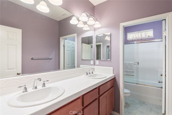 Bathroom, Dual Sink Vanities, Glass Shower, Interior, Tile Countertops