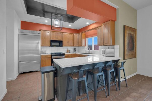 Interior, Kitchen, Pendant Lights, Recessed Lighting, Stainless Steel Appliances, Tile Countertops