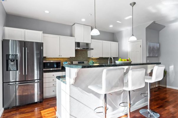 Interior, Kitchen, Pendant Lights, Recessed Lighting, Stainless Steel Appliances, Wood Texture Flooring