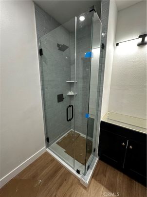 Bathroom, Glass Shower, Interior, Recessed Lighting, Wood Texture Flooring