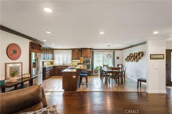 Dining room, Interior, Kitchen, Pendant Lights, Recessed Lighting, Stainless Steel Appliances, Wood Texture Flooring