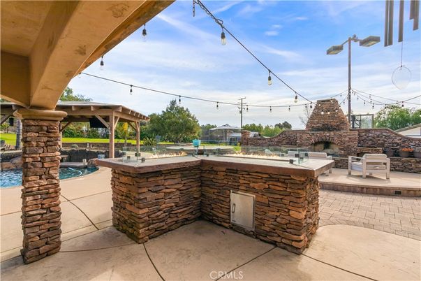 Exterior, Fireplace, Pool