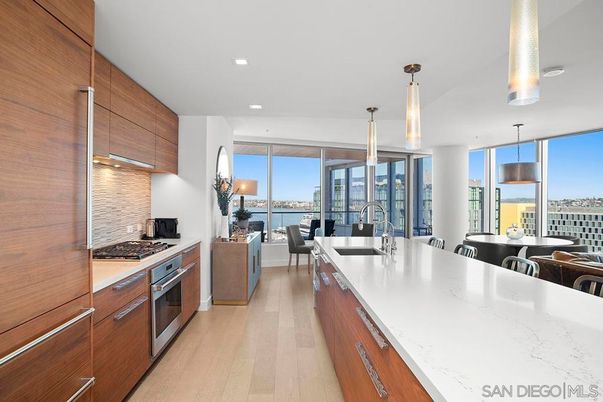 Dining room, Interior, Kitchen, Pendant Lights, Recessed Lighting, Stainless Steel Appliances, Water, Wood Texture Flooring