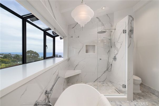 Bathroom, Free Standing Baths, Glass Shower, Interior, Marble Walls, Recessed Lighting, Water