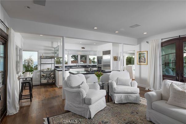 Dining room, Interior, Kitchen, Living room, Recessed Lighting, Stainless Steel Appliances, Wood Texture Flooring