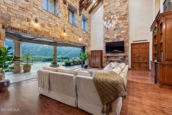 Fireplace, Interior, Living room, Pendant Lights, Stone Walls, Wood Texture Flooring
