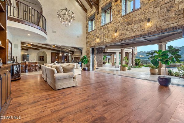 Chandelier, Dining room, Interior, Living room, Pendant Lights, Stone Walls, Wood Texture Flooring