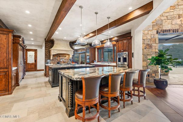 Interior, Kitchen, Pendant Lights, Recessed Lighting, Stainless Steel Appliances, Stone Walls, Wooden Beams