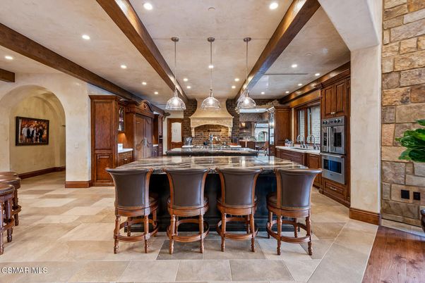 Interior, Kitchen, Pendant Lights, Recessed Lighting, Stainless Steel Appliances, Stone Walls, Wooden Beams