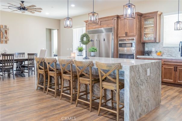Dining room, Interior, Kitchen, Pendant Lights, Recessed Lighting, Stainless Steel Appliances, Wood Texture Flooring