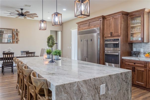 Dining room, Interior, Kitchen, Pendant Lights, Recessed Lighting, Stainless Steel Appliances, Wood Texture Flooring