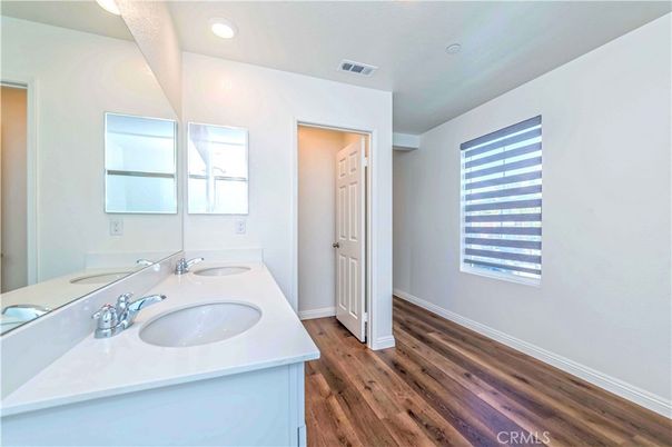Bathroom, Dual Sink Vanities, Interior, Recessed Lighting, Wood Texture Flooring