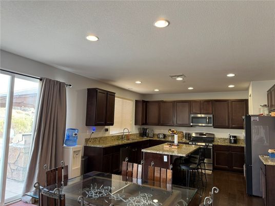 Dining room, Interior, Kitchen, Recessed Lighting, Stainless Steel Appliances, Wood Texture Flooring