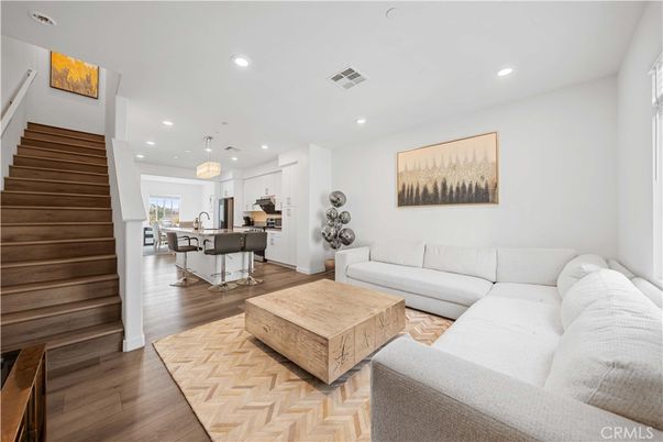 Dining room, Interior, Kitchen, Living room, Pendant Lights, Recessed Lighting, Stainless Steel Appliances, Wood Texture Flooring