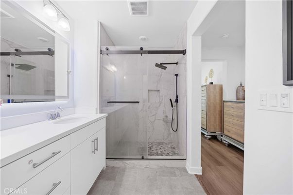Bathroom, Glass Shower, Interior, Marble Walls, Wood Texture Flooring