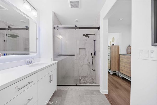 Bathroom, Glass Shower, Interior, Marble Walls, Wood Texture Flooring