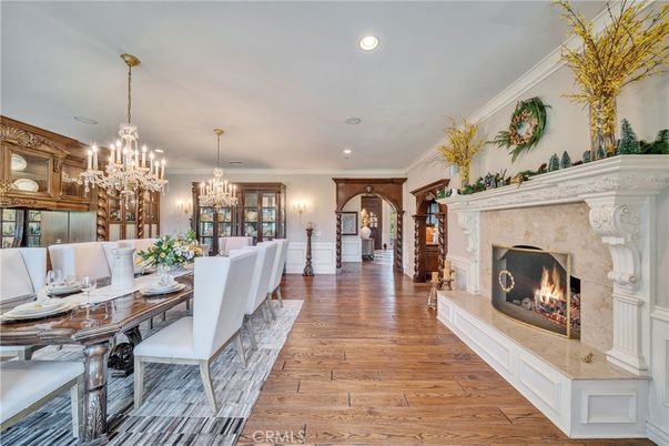 Chandelier, Dining room, Fireplace, Interior, Recessed Lighting, Wood Texture Flooring