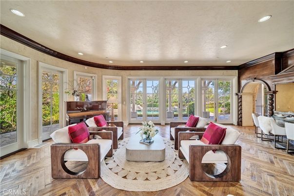 Dining room, Fireplace, Interior, Living room, Recessed Lighting, Wood Texture Flooring