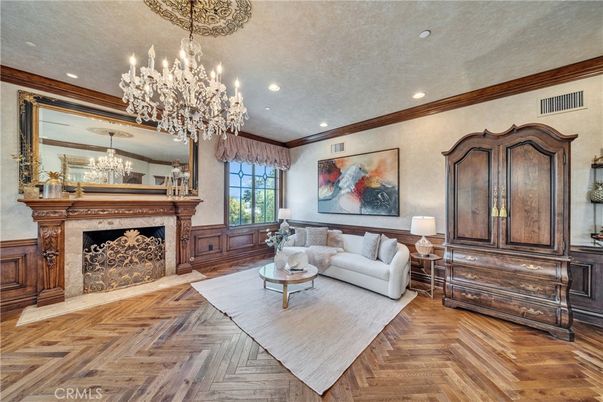 Chandelier, Fireplace, Interior, Living room, Recessed Lighting, Wood Texture Flooring