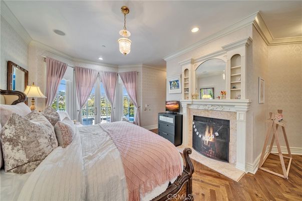 Bedroom, Fireplace, Interior, Pendant Lights, Recessed Lighting, Wood Texture Flooring