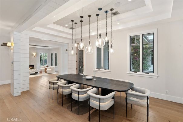 Dining room, Fireplace, Interior, Living room, Pendant Lights, Recessed Lighting, Wood Texture Flooring