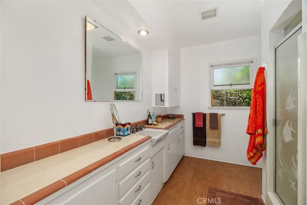 Bathroom, Interior, Recessed Lighting, Tile Countertops, Wood Texture Flooring