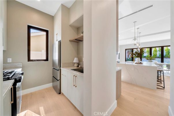 Dining room, Interior, Kitchen, Pendant Lights, Recessed Lighting, Stainless Steel Appliances, Wood Texture Flooring