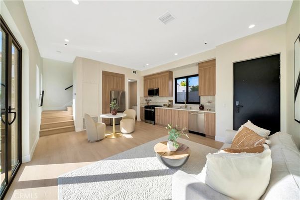 Dining room, Interior, Kitchen, Living room, Recessed Lighting, Stainless Steel Appliances, Wood Texture Flooring