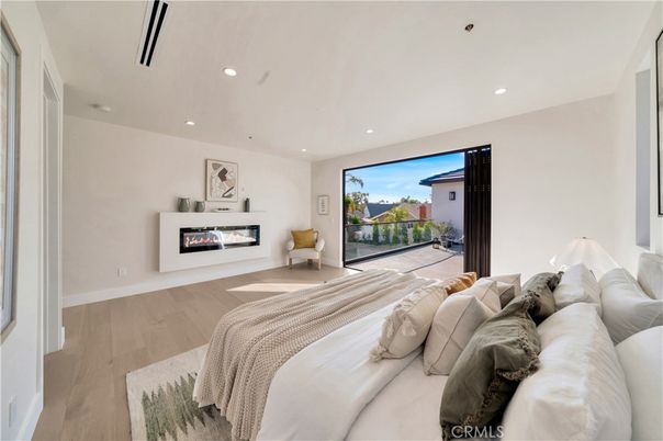 Bedroom, Fireplace, Interior, Recessed Lighting, Wood Texture Flooring