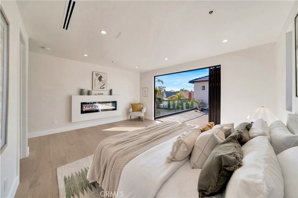 Bedroom, Fireplace, Interior, Recessed Lighting, Wood Texture Flooring