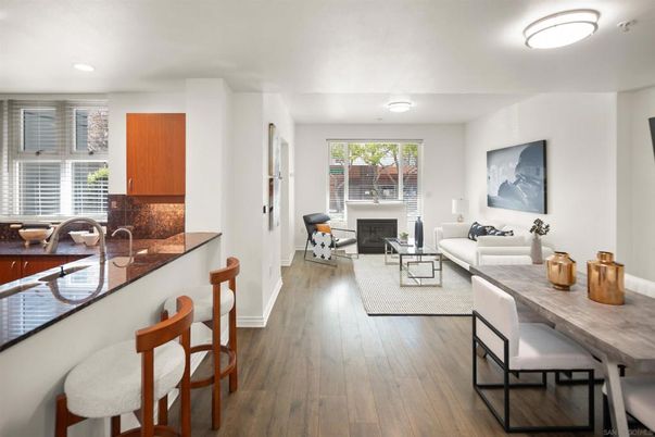 Dining room, Fireplace, Interior, Living room, Recessed Lighting, Wood Texture Flooring