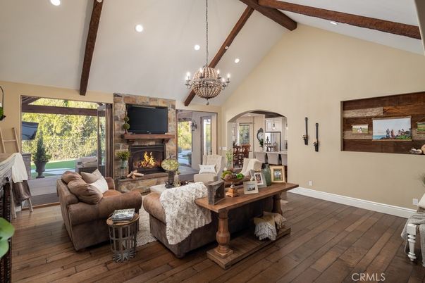 Chandelier, Fireplace, Interior, Living room, Recessed Lighting, Wooden Beams, Wood Texture Flooring