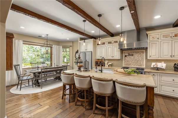 Dining room, Interior, Kitchen, Pendant Lights, Recessed Lighting, Stainless Steel Appliances, Wooden Beams, Wood Texture Flooring
