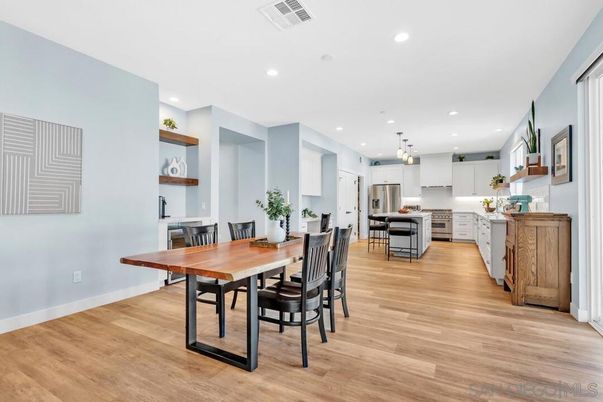 Dining room, Interior, Kitchen, Pendant Lights, Recessed Lighting, Stainless Steel Appliances, Wood Texture Flooring