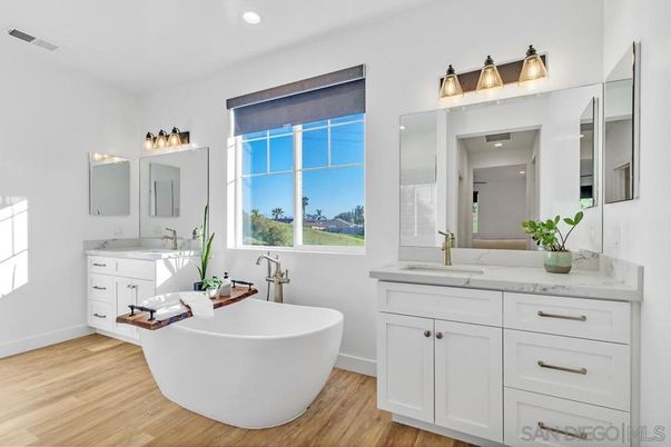 Bathroom, Dual Sink Vanities, Free Standing Baths, Interior, Recessed Lighting, Wood Texture Flooring