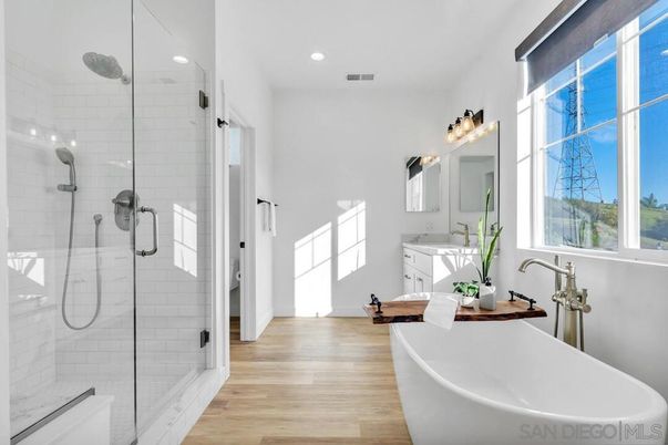 Bathroom, Free Standing Baths, Glass Shower, Interior, Recessed Lighting, Wood Texture Flooring