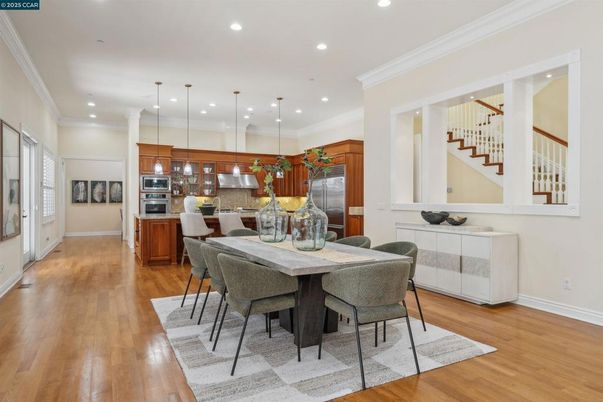 Dining room, Interior, Kitchen, Pendant Lights, Recessed Lighting, Stainless Steel Appliances, Wood Texture Flooring