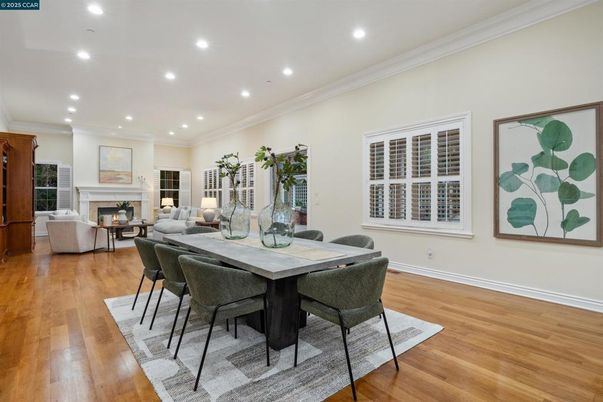 Dining room, Fireplace, Interior, Living room, Recessed Lighting, Wood Texture Flooring