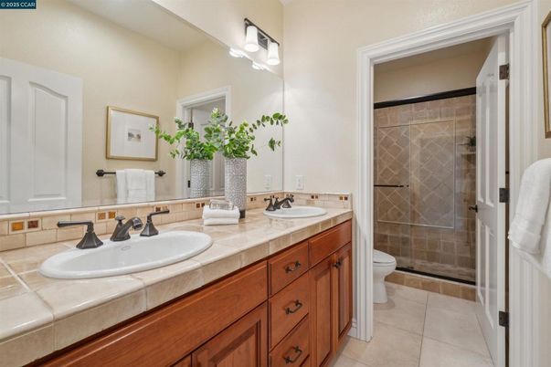 Bathroom, Dual Sink Vanities, Glass Shower, Interior, Tile Countertops